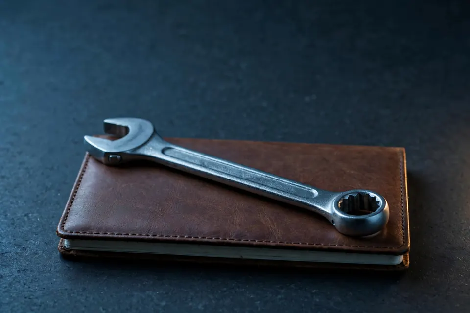 Wrench on a closed notebook